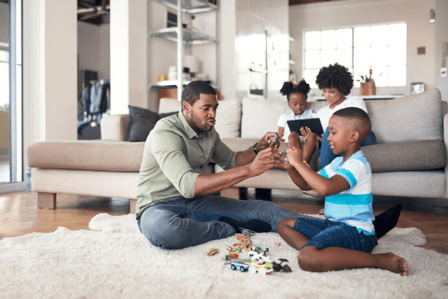 Family enjoying time together and smiling.