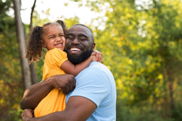 Foster Dad hugging Foster child